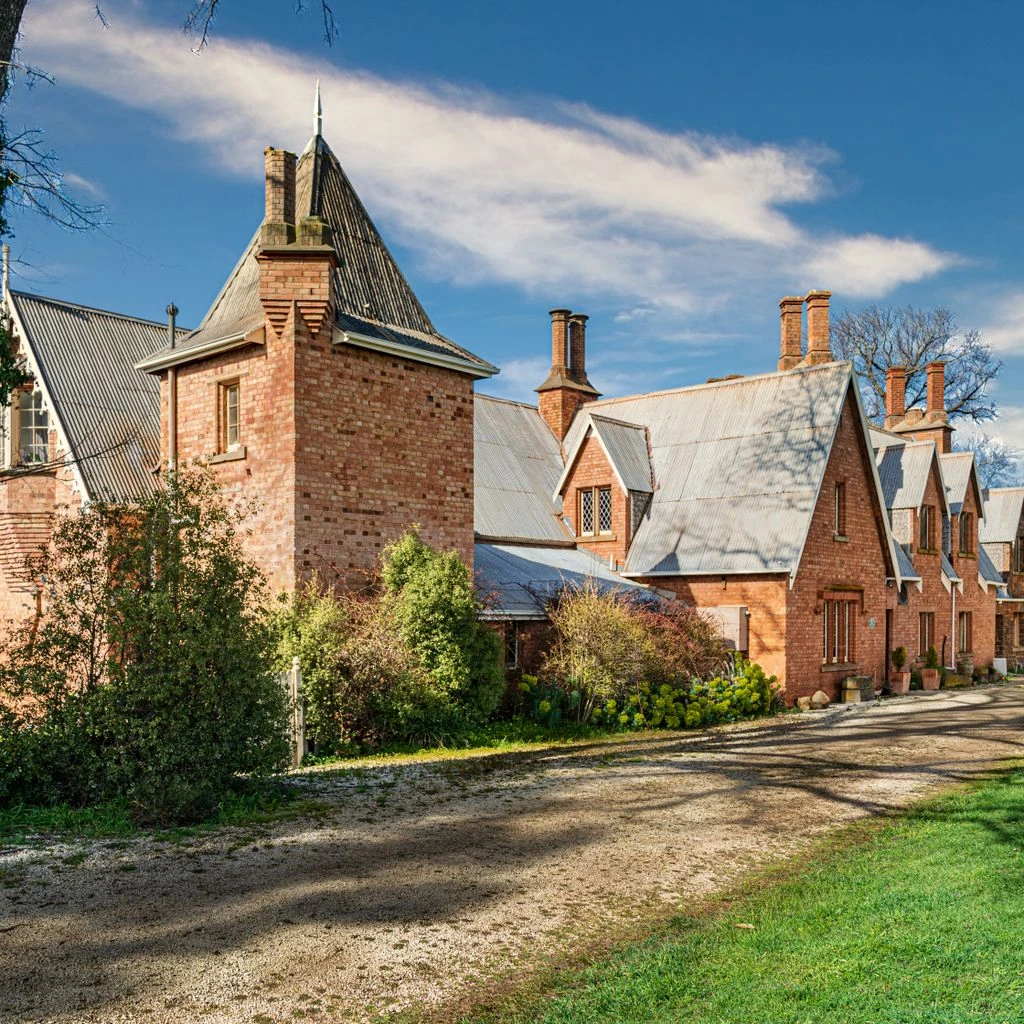A brick colonial on a wooded Inverness lot.
